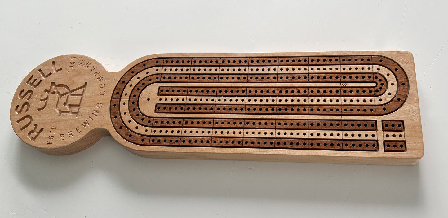Inlayed, wooden cribbage board with custom branding.