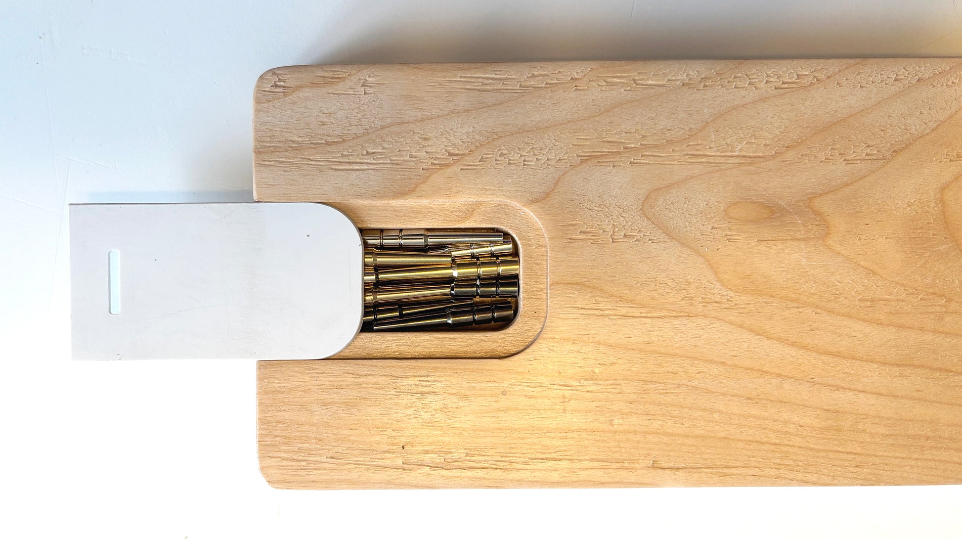 Crib board peg holder.