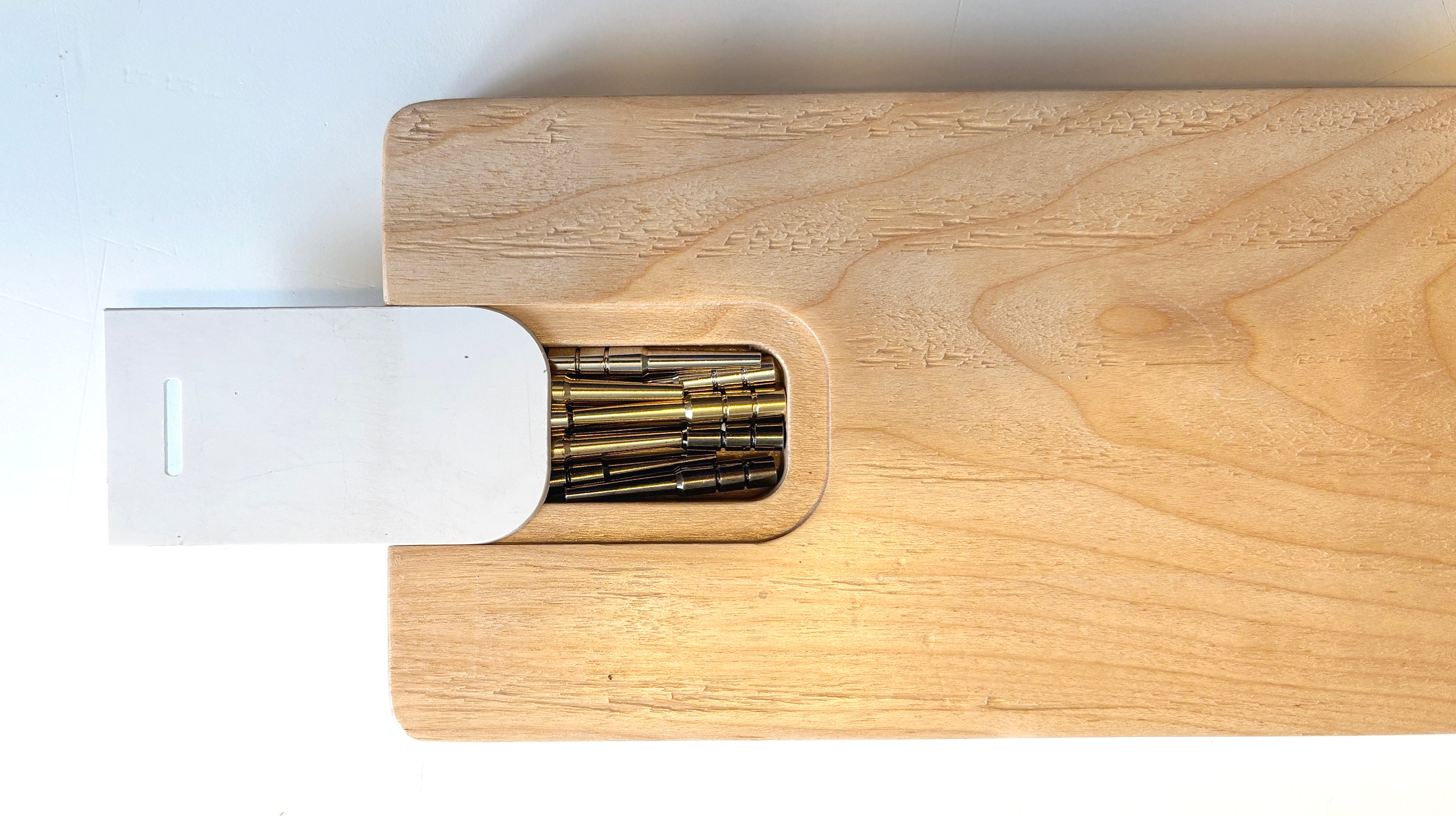 Crib board peg holder.