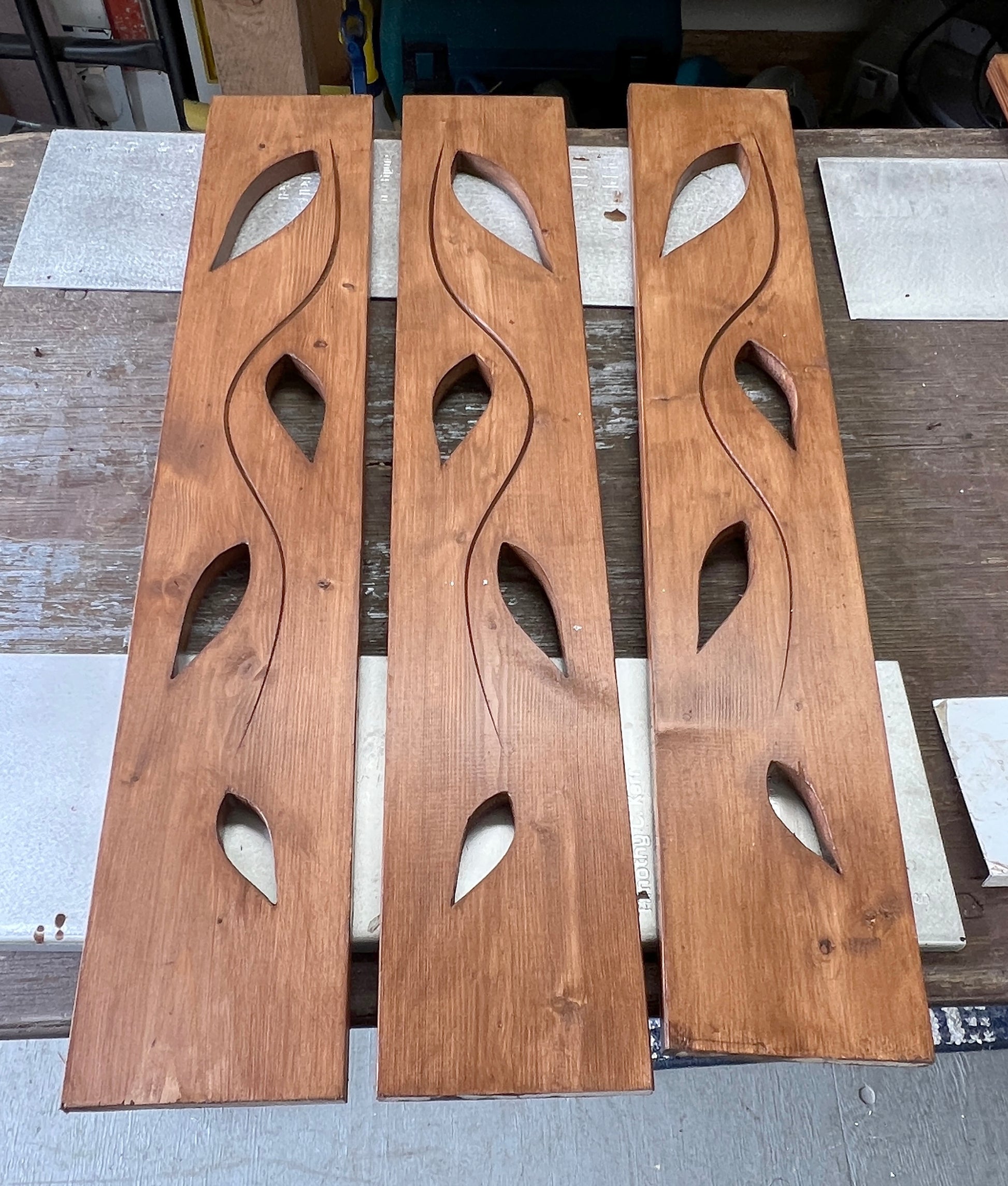 Wooden panels with cut-out designs.